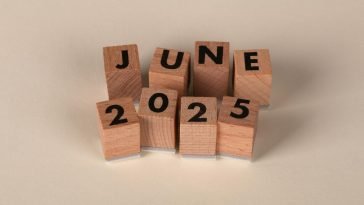 Wooden blocks displaying the text 'June 2025' in a neat arrangement.