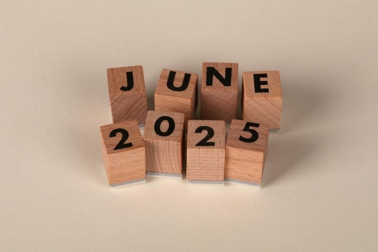 Wooden blocks displaying the text 'June 2025' in a neat arrangement.
