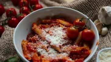 Tasty penne pasta in a rich tomato sauce, topped with parmesan cheese.