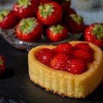 A delectable strawberry tart with fresh strawberries, perfect for summer desserts.