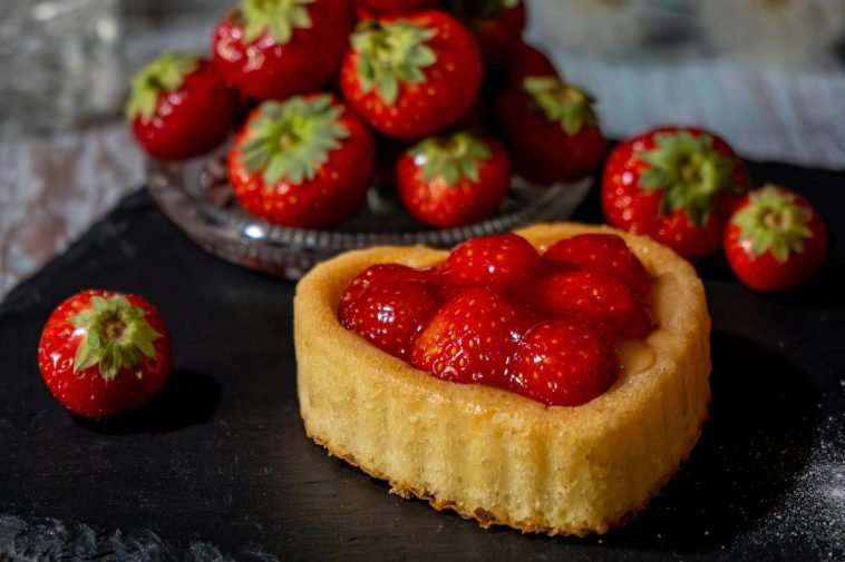 A delectable strawberry tart with fresh strawberries, perfect for summer desserts.